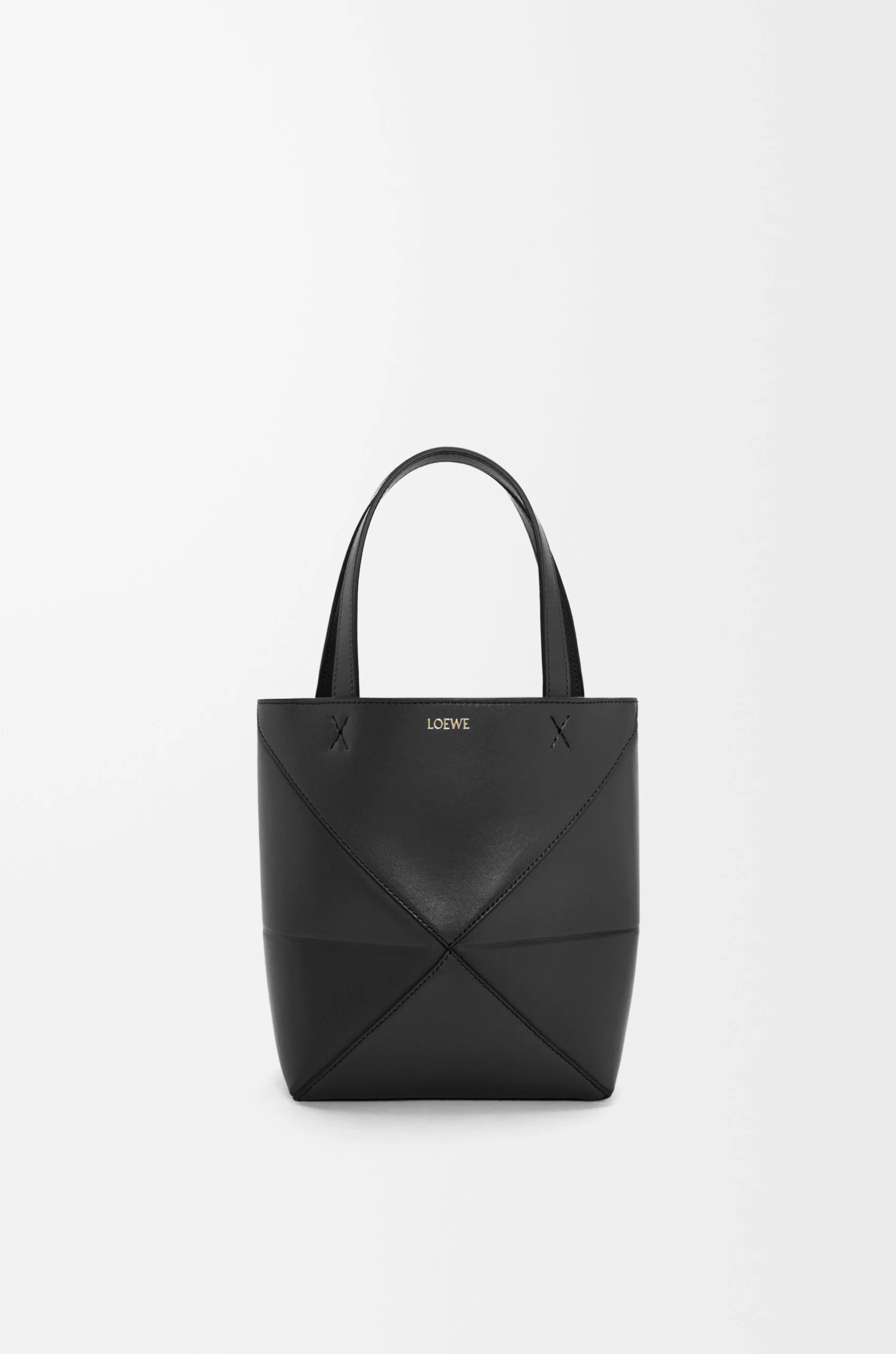 74f024e6f41d57212f1848c62b525eea-scaled-1.webp Mini Puzzle Fold tote in shiny calfskin - Image 1